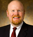 Eric J. Christensen, Executive Director